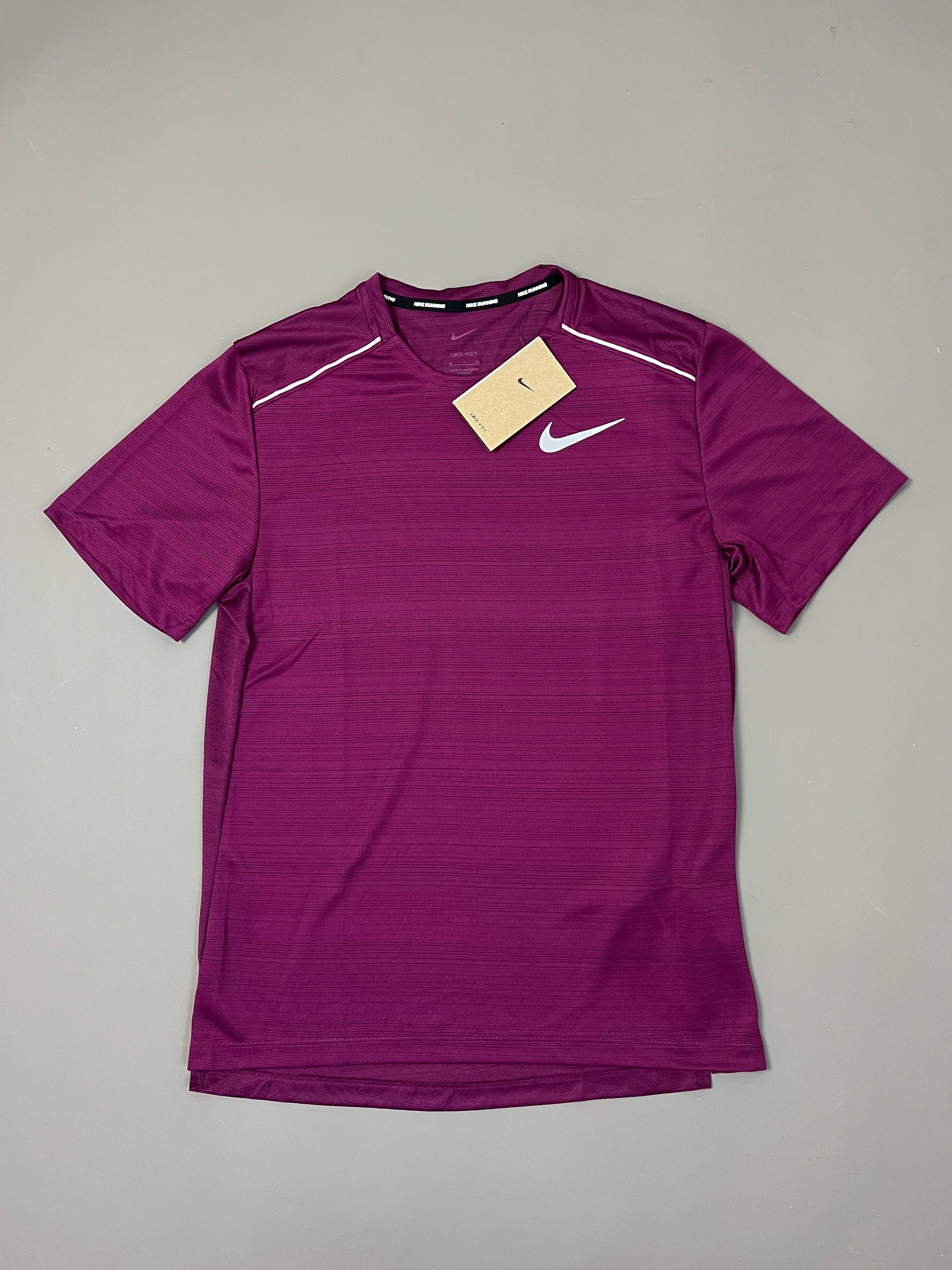 purple pink nike shirt